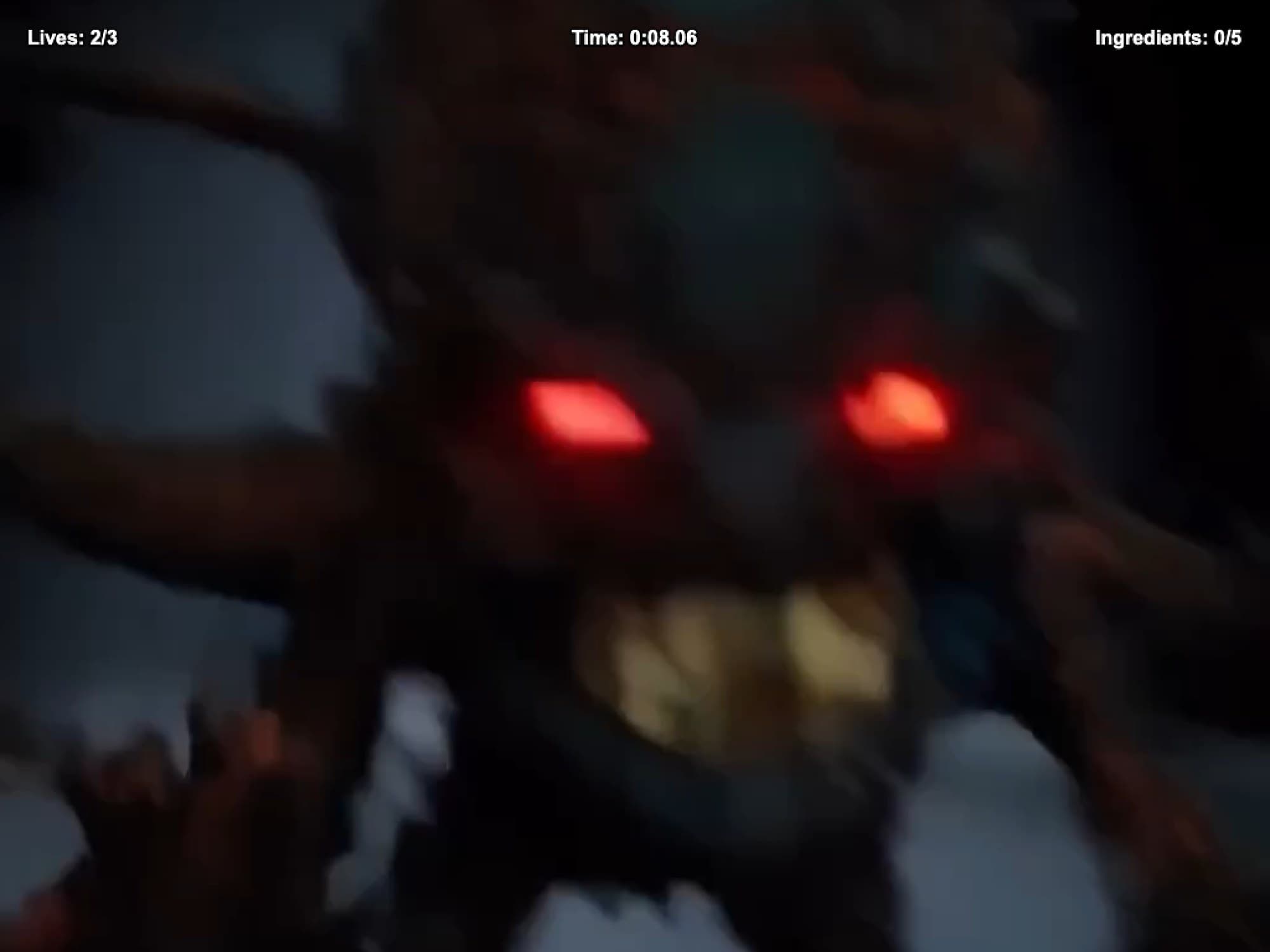 A full-screen jump scare in Maze Antidote: a blurred monster face with glowing red eyes and bared teeth, with the HUD showing 2 of 3 lives left.